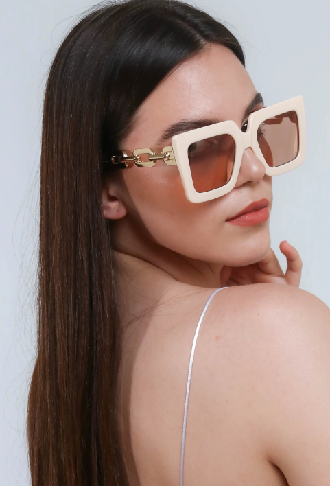 Beige fashion sunglasses with a rectangular frame, showcasing UV400 protection and scratch-resistant lenses.