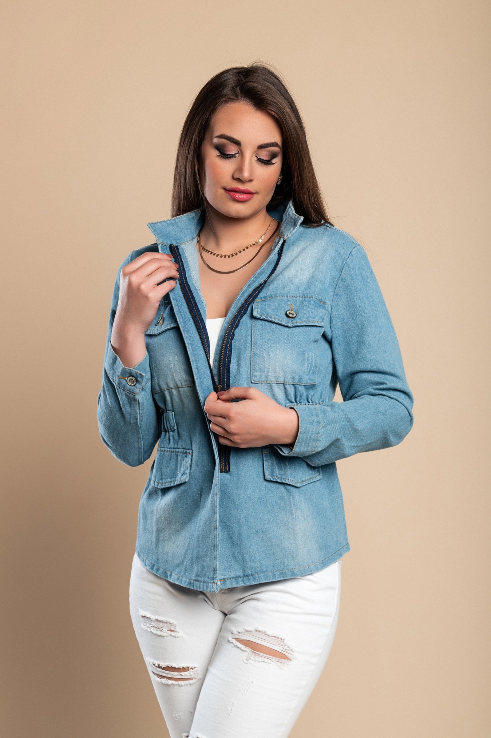 Fashionable Pembi denim jacket featuring long sleeves, stylish slits, decorative zipper on collar, and elastic waist, made from high-quality cotton.