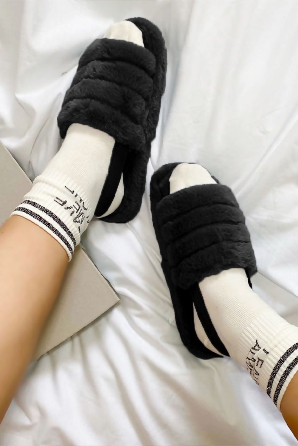 Cozy Faux Fur Fluffy Stripe Slippers with a heel strap, featuring a stylish stripe design in soft faux fur.