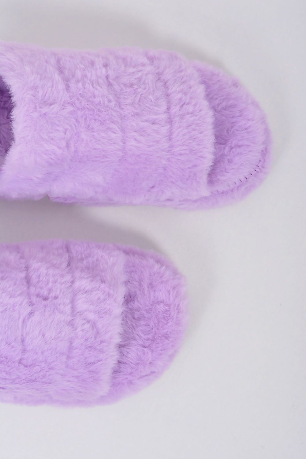 Cozy Faux Fur Fluffy Stripe Slippers with a heel strap, featuring a stylish stripe design in soft faux fur.