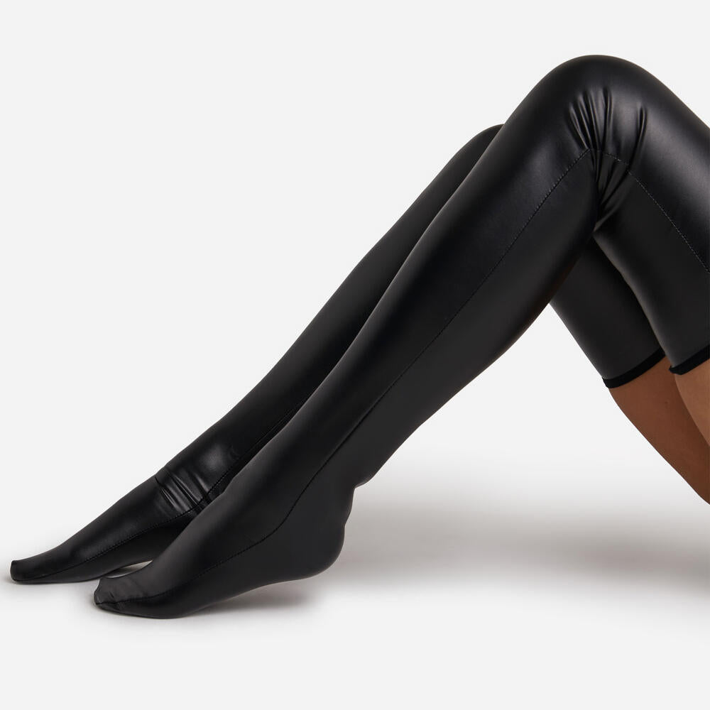 A pair of stylish faux leather over-the-knee socks in black, showcasing their sleek design and comfortable fit.