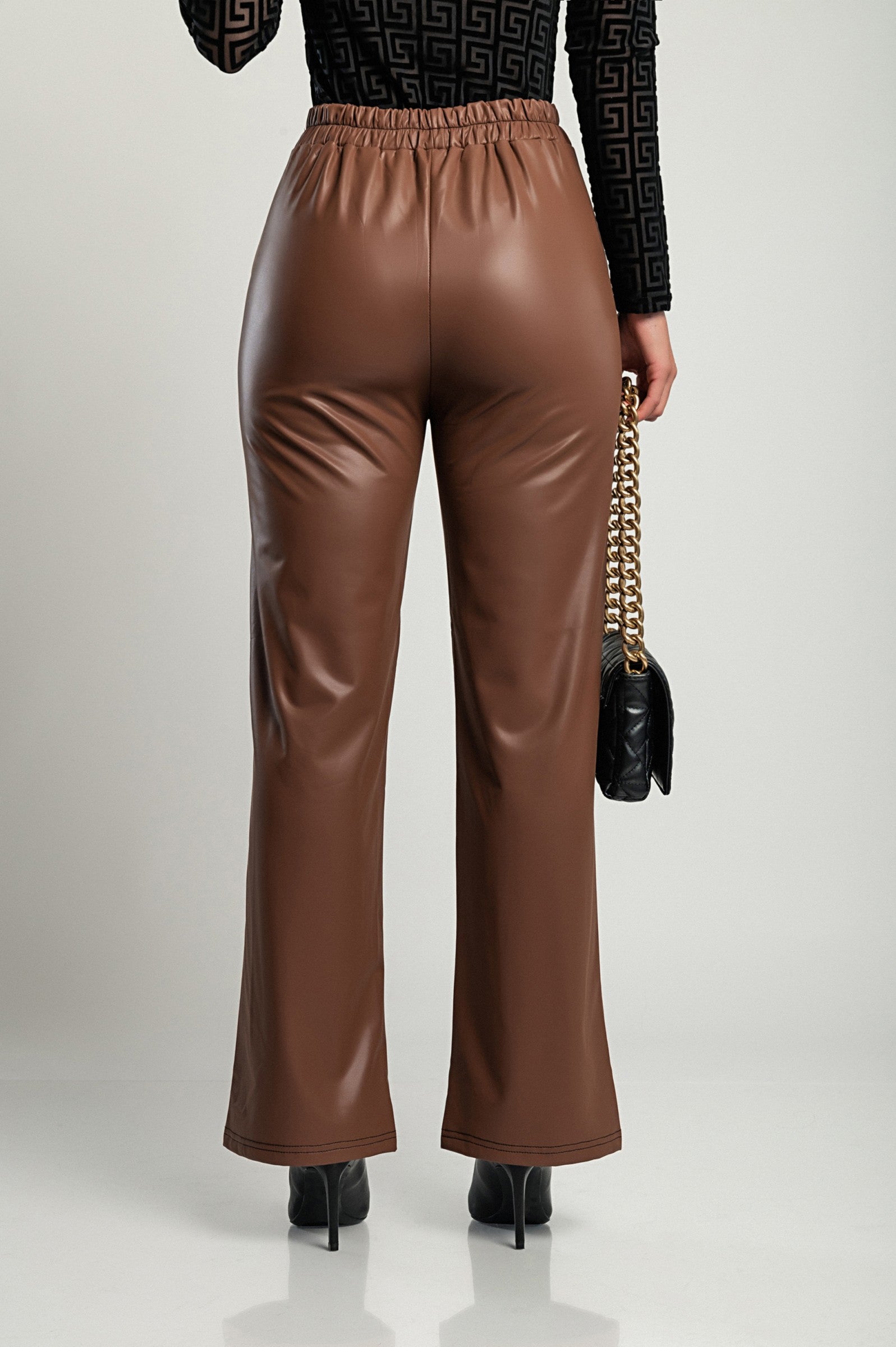 Stylish brown faux leather pants with high elastic waist and straight leg design, featuring side pockets and padded lining.