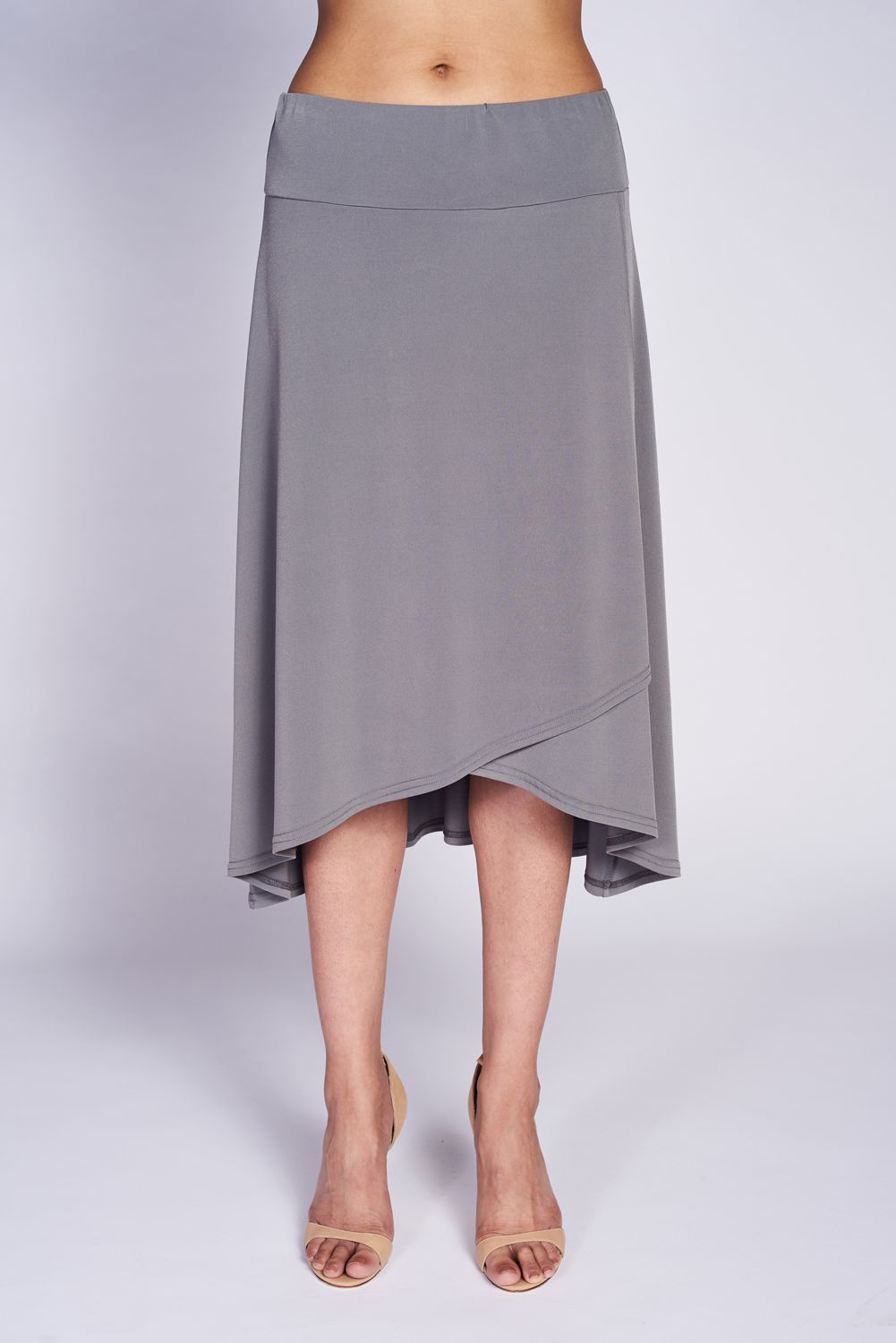 A stylish faux wrap skirt featuring a flared bottom and elastic waistband, perfect for versatile wear.