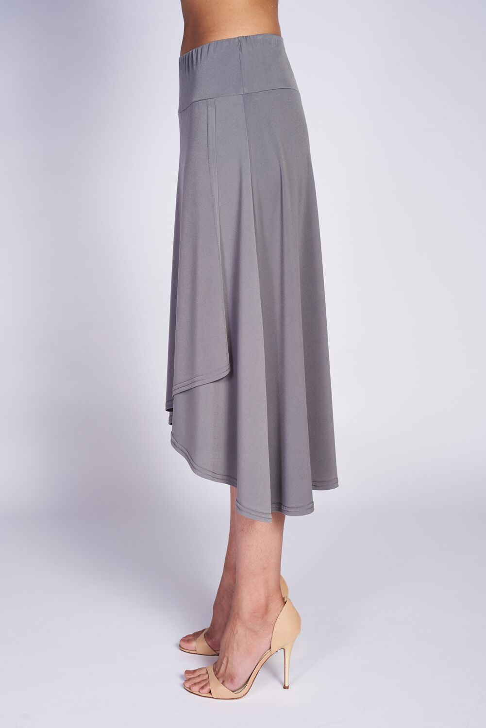 A stylish faux wrap skirt featuring a flared bottom and elastic waistband, perfect for versatile wear.