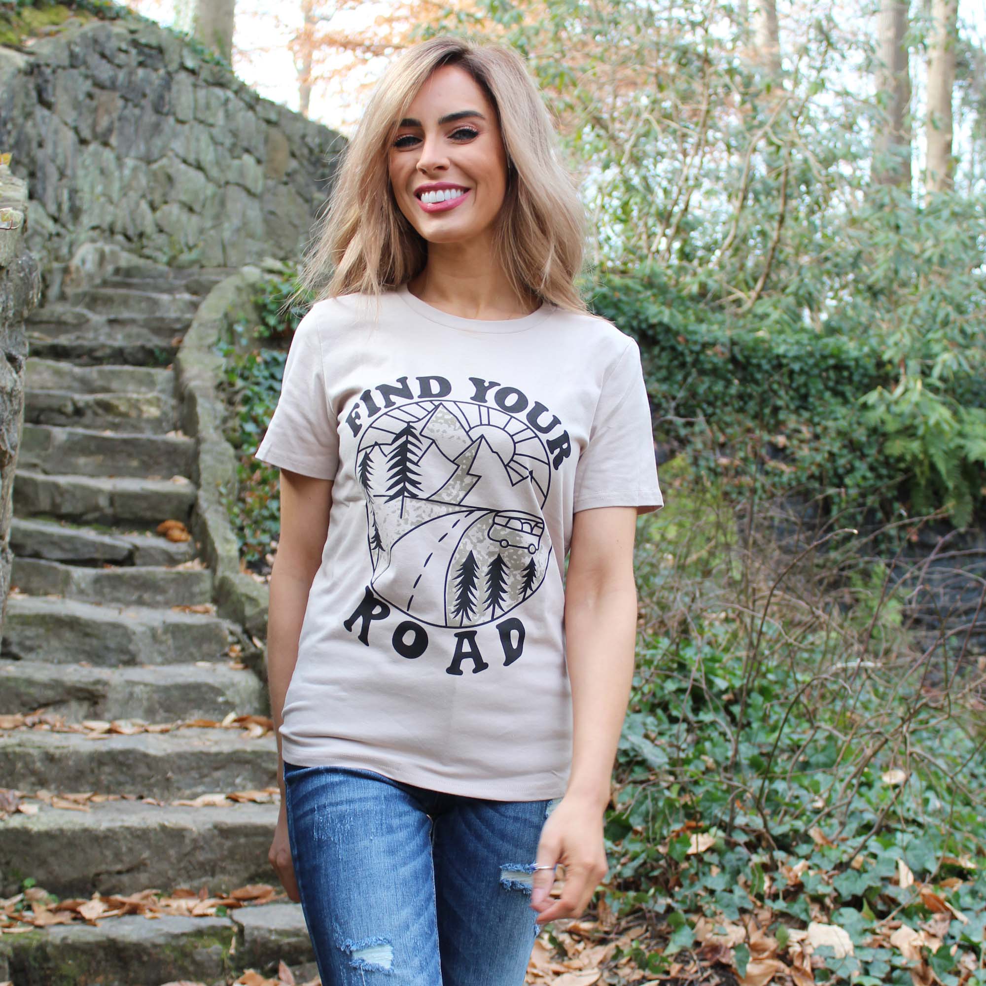 A vintage-inspired Find Your Road T-Shirt in soft fabric, perfect for casual outings.