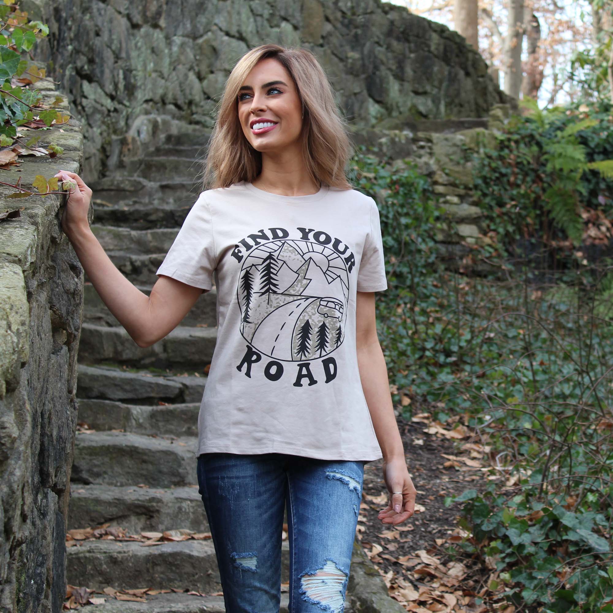 A vintage-inspired Find Your Road T-Shirt in soft fabric, perfect for casual outings.