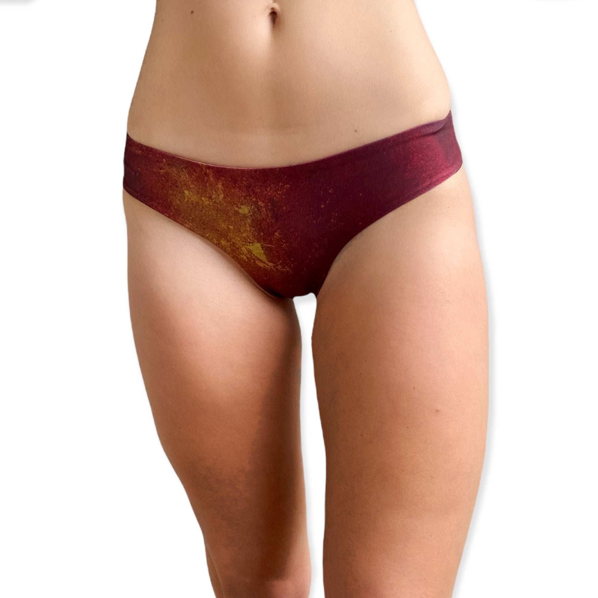 Fire Brazilian Bikini Bottom showcasing minimal coverage and cheeky design, perfect for summer tanning.