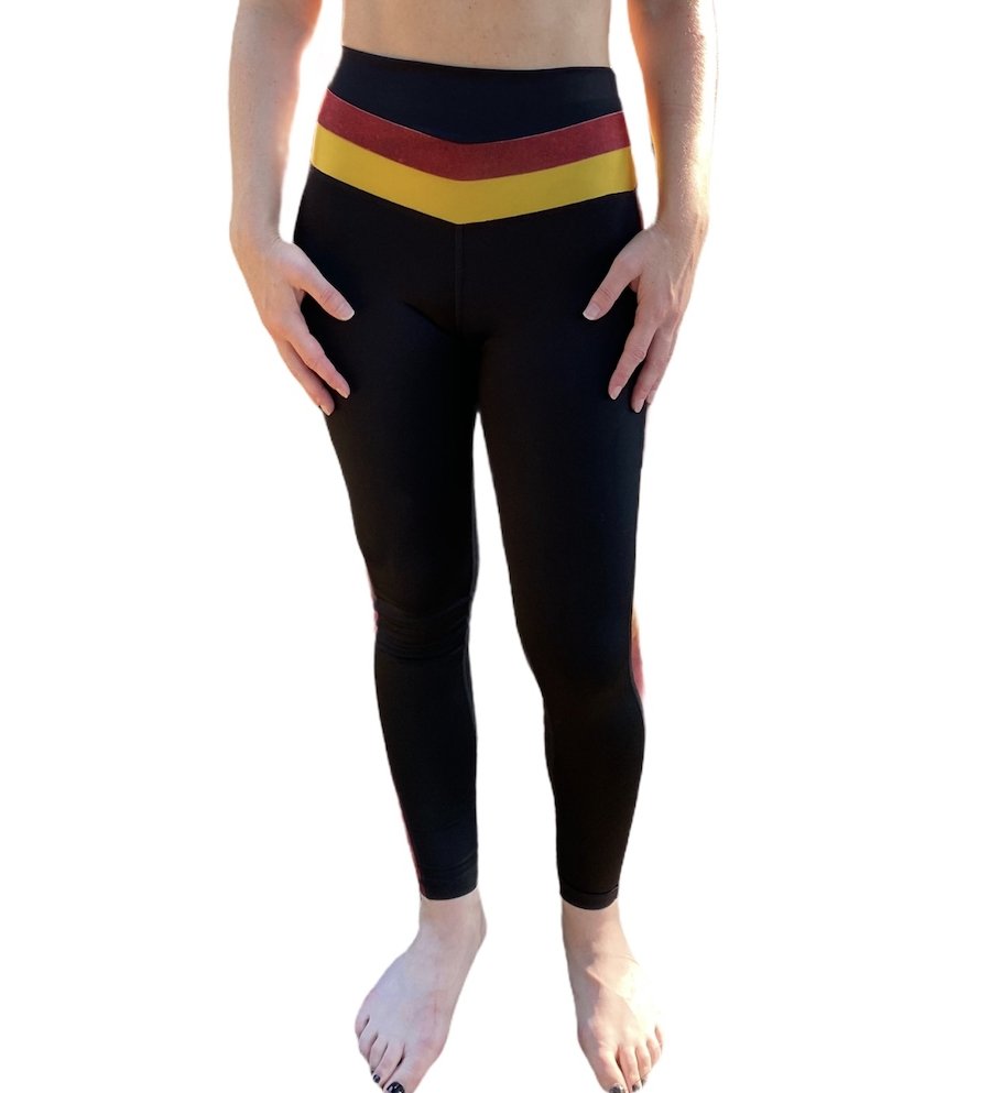 Fire Yoga Leggings with Pockets featuring a high-waisted design and ribbed panel details, perfect for workouts and casual wear.