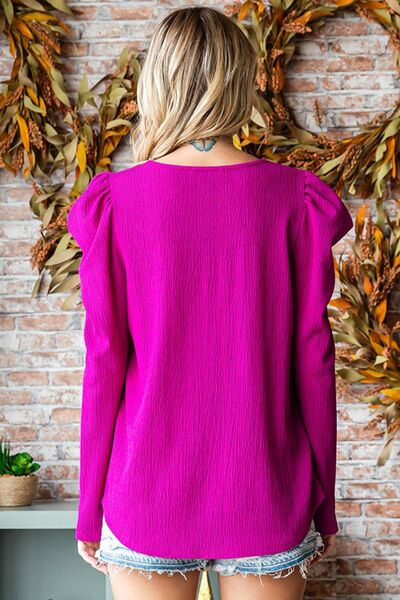 Chic Texture Puff Sleeve Round Neck Blouse in elegant design with puff sleeves and round neck.