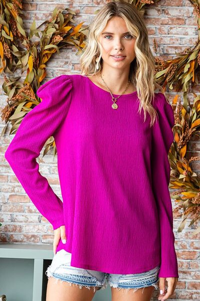 Chic Texture Puff Sleeve Round Neck Blouse in elegant design with puff sleeves and round neck.