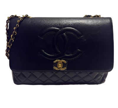 Flap with Top Black Lux Bag featuring gold CC clasp and spacious interior design.