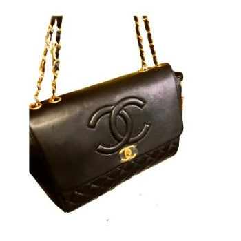 Flap with Top Black Lux Bag featuring gold CC clasp and spacious interior design.