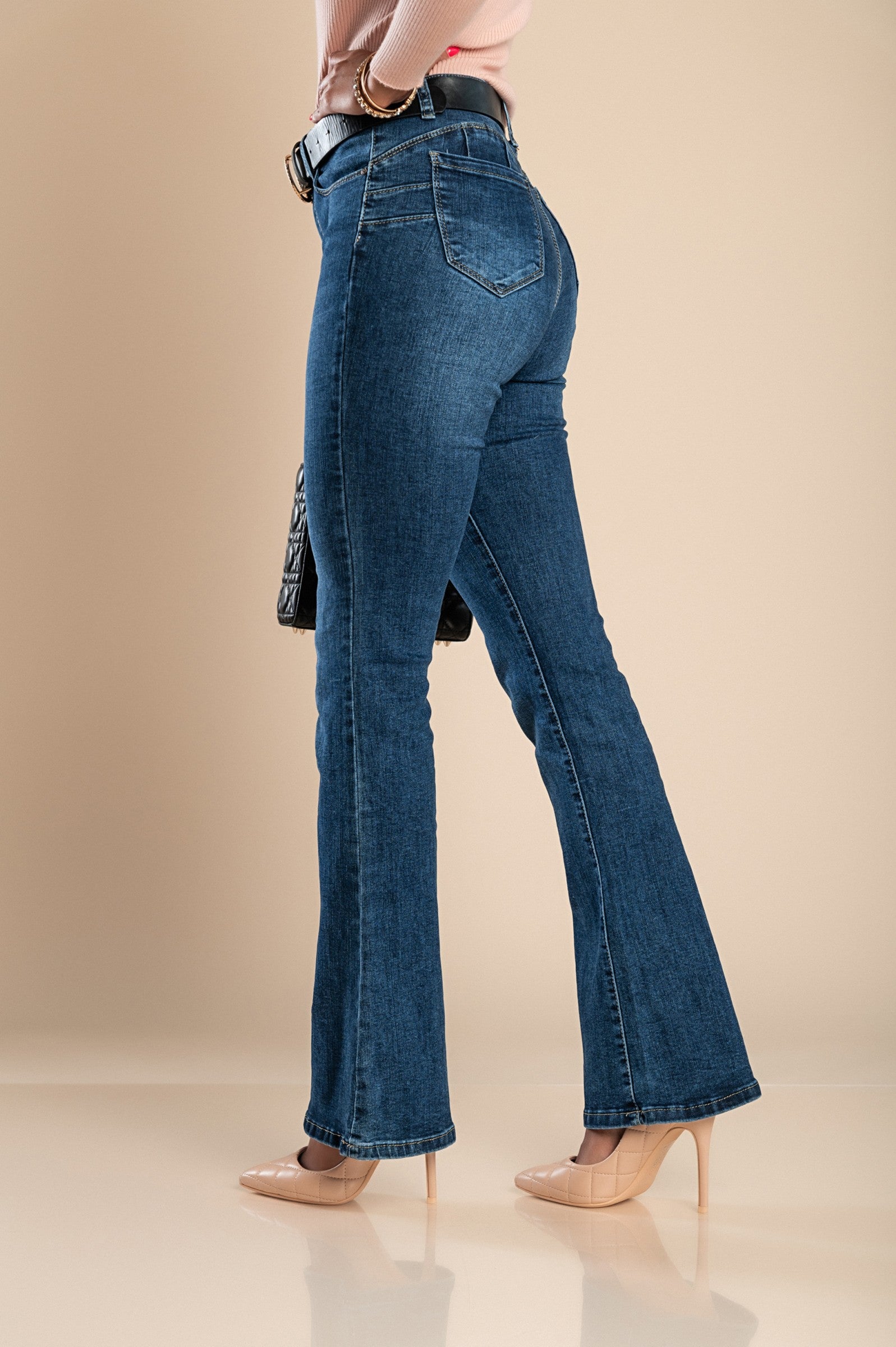 Flared jeans Cativera in blue, featuring a stylish flared leg design, front and back pockets, and a button and zipper closure.