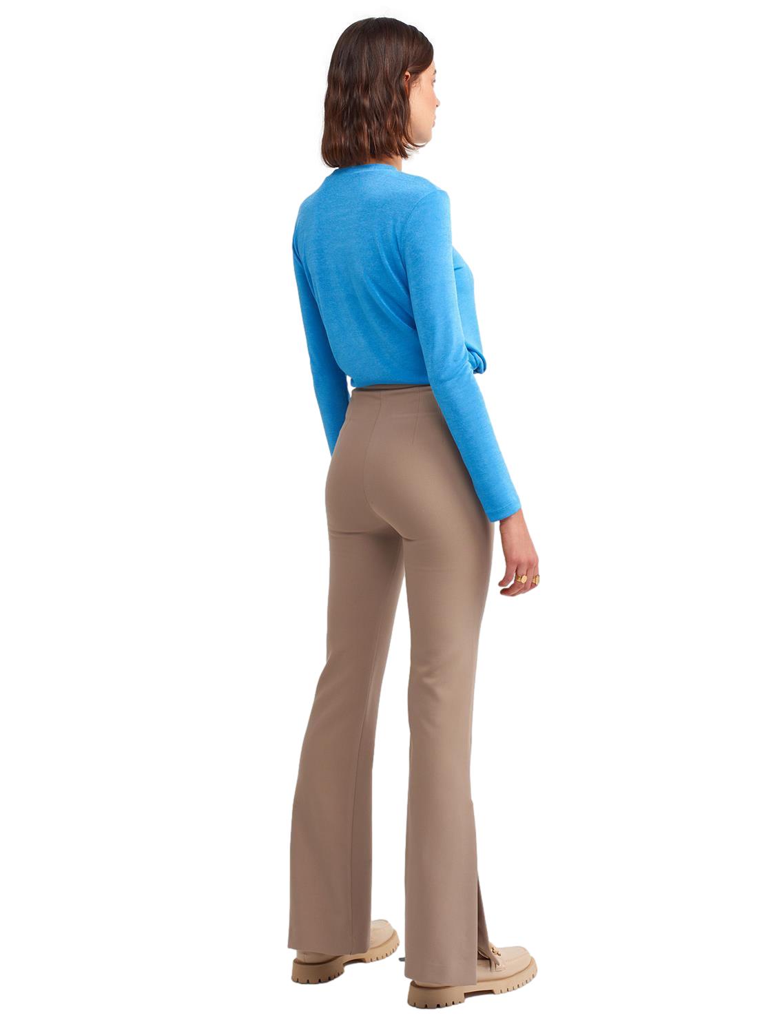 A pair of stylish flared trousers with slits on the sides, made from a comfortable blend of polyester, viscose, and elastane, displayed on a mannequin.