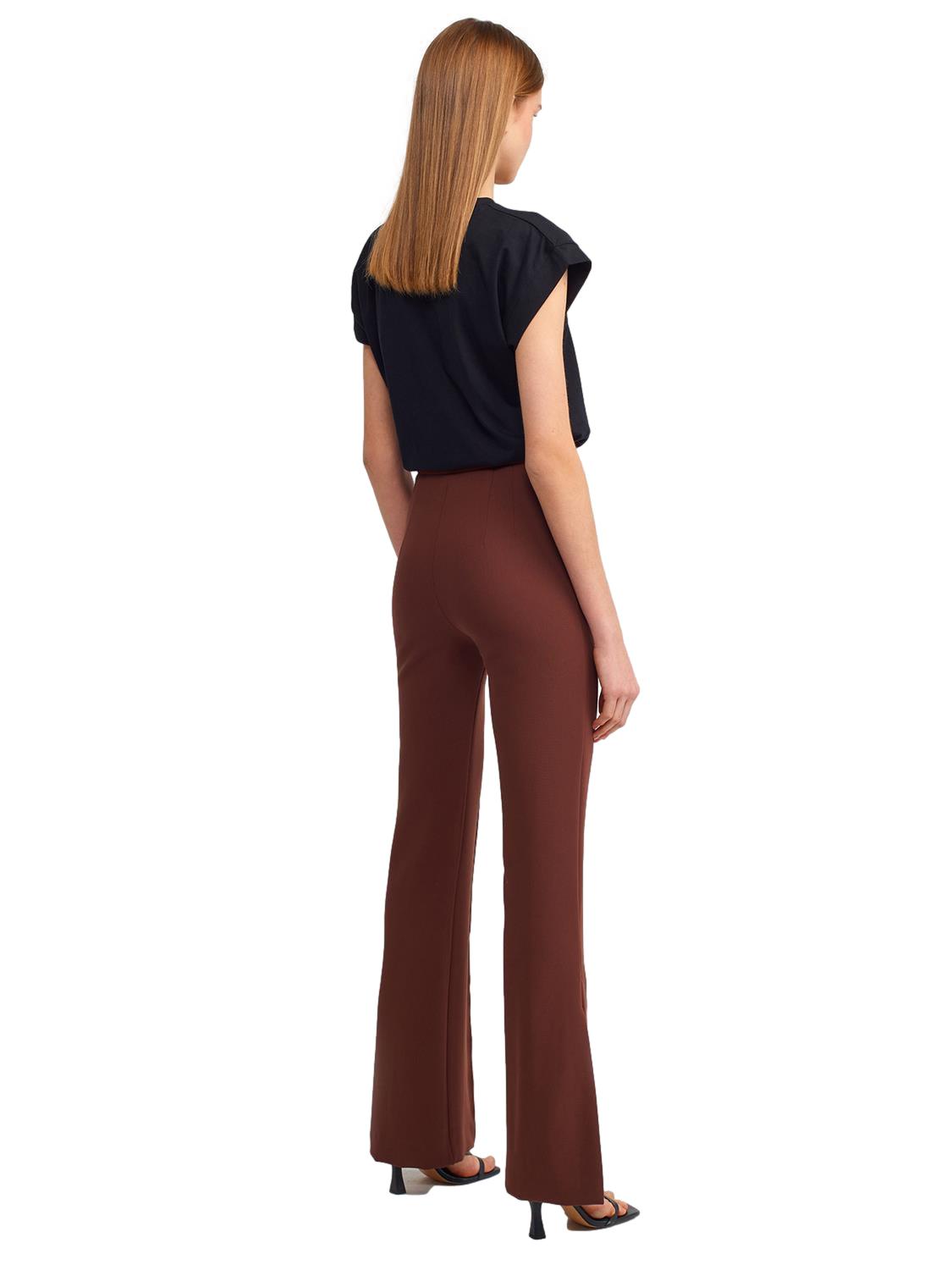 A pair of stylish flared trousers with slits on the sides, made from a comfortable blend of polyester, viscose, and elastane, displayed on a mannequin.