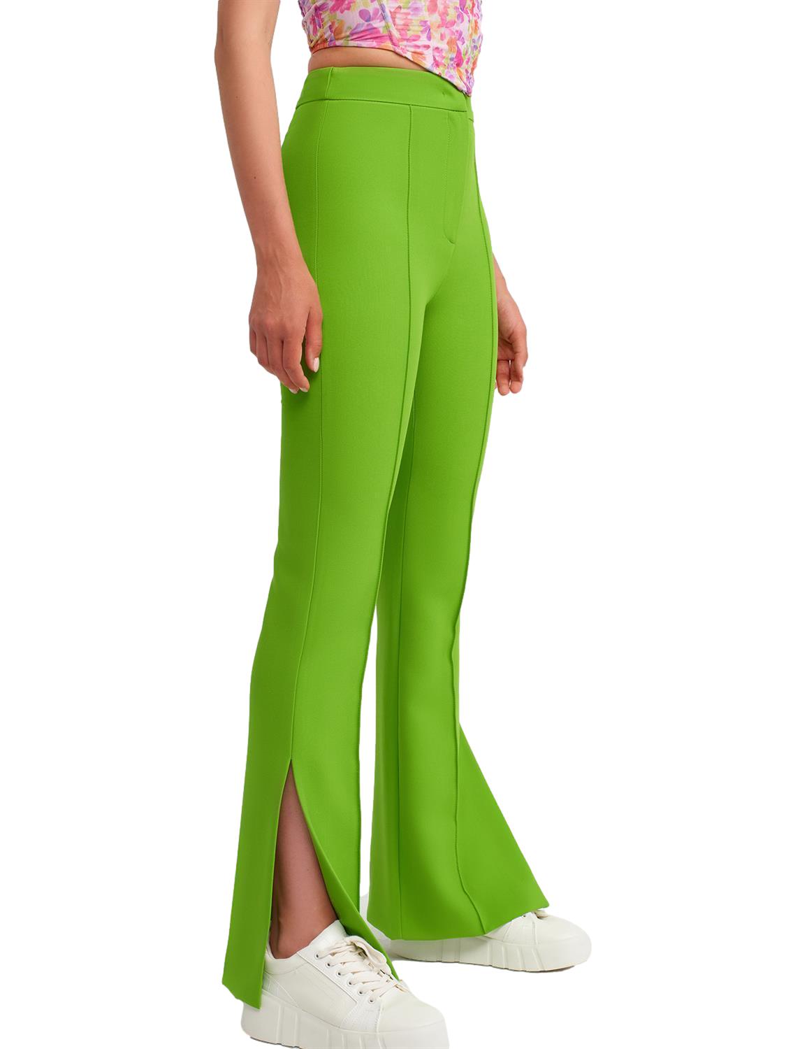 A pair of stylish flared trousers with slits on the sides, made from a comfortable blend of polyester, viscose, and elastane, displayed on a mannequin.