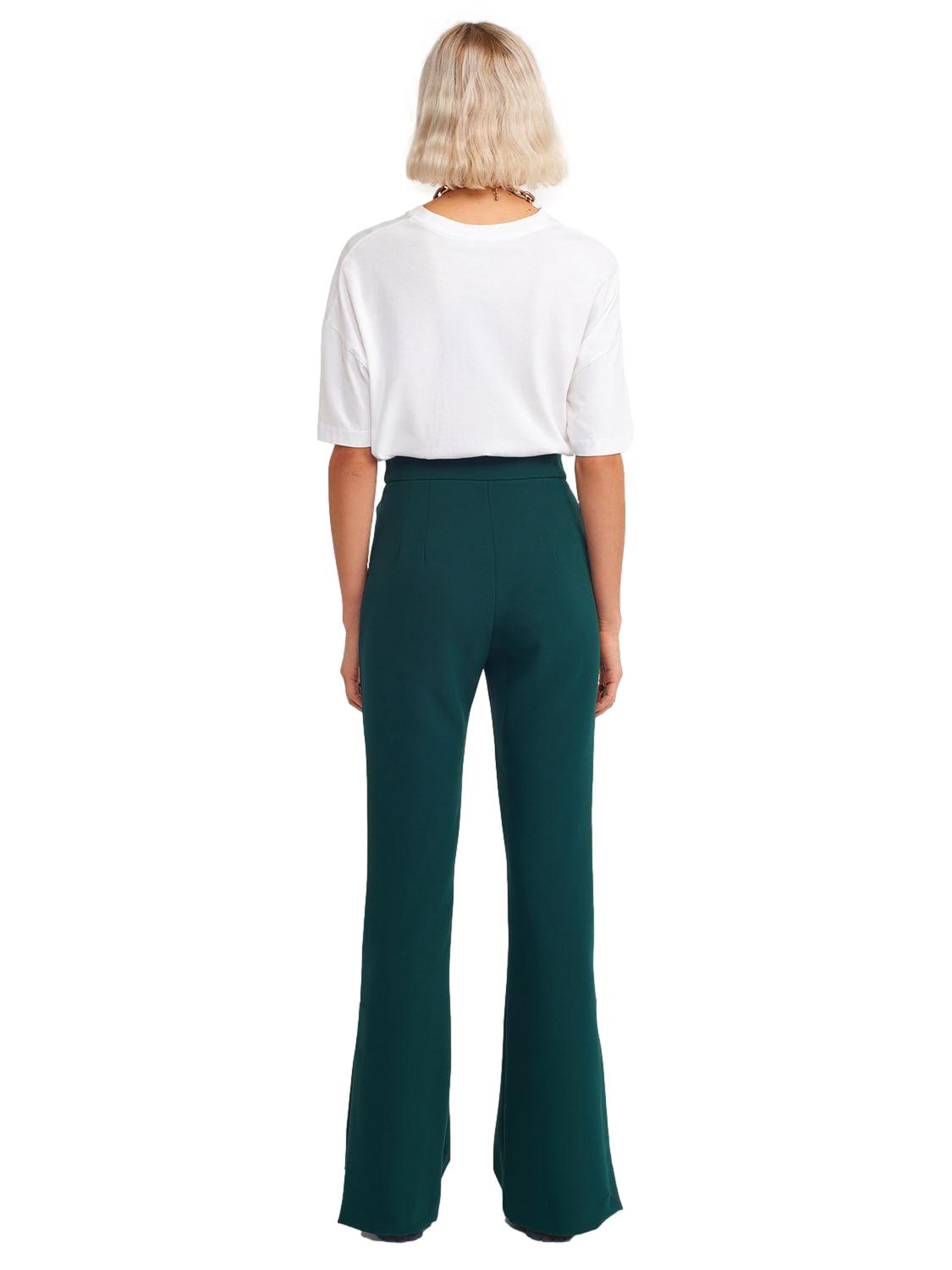 A pair of stylish flared trousers with slits on the sides, made from a comfortable blend of polyester, viscose, and elastane, displayed on a mannequin.