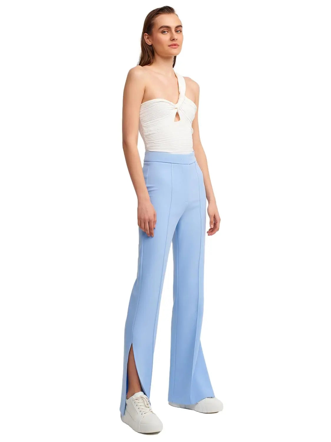 A pair of stylish flared trousers with slits on the sides, made from a comfortable blend of polyester, viscose, and elastane, displayed on a mannequin.