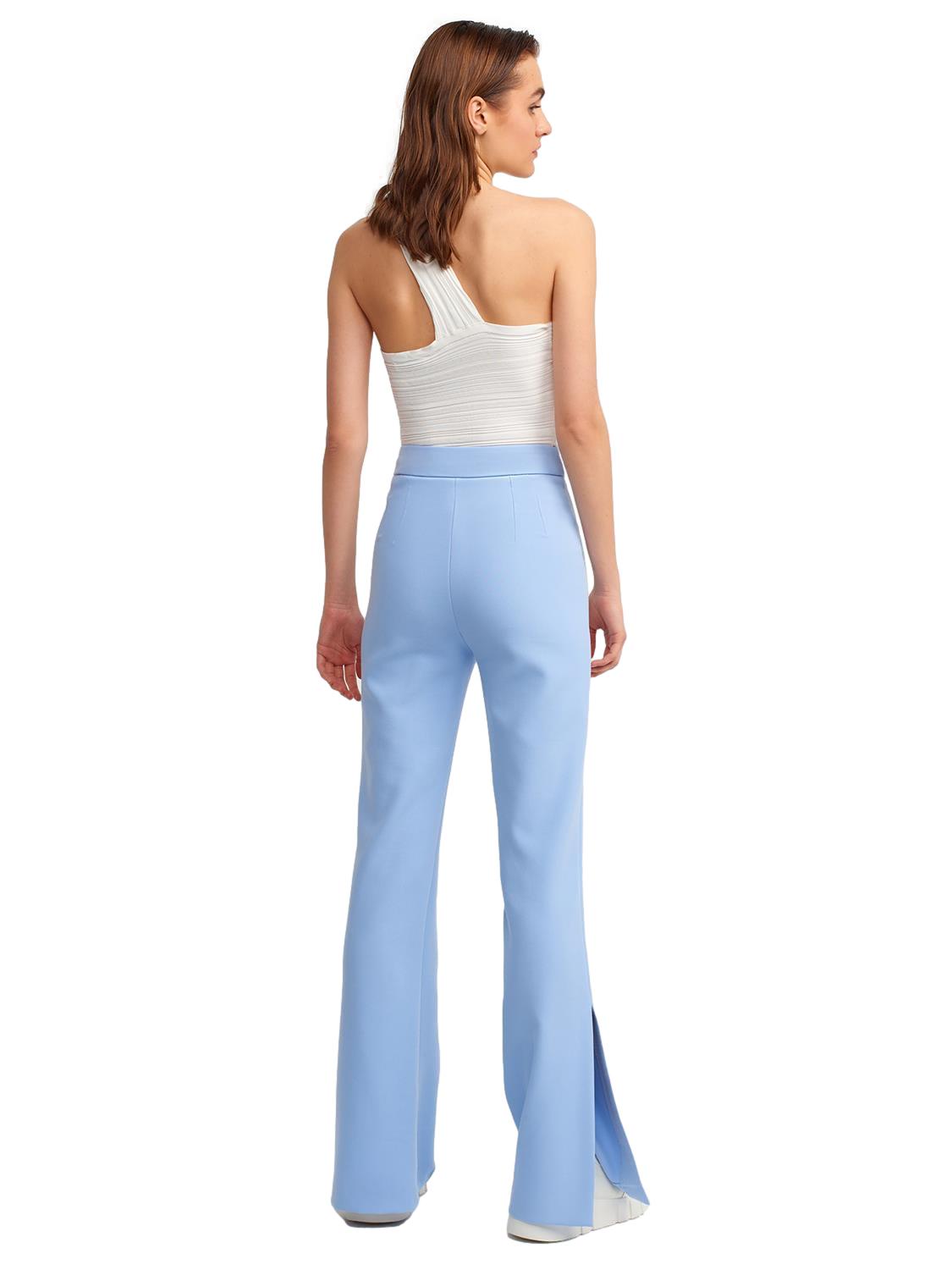 A pair of stylish flared trousers with slits on the sides, made from a comfortable blend of polyester, viscose, and elastane, displayed on a mannequin.