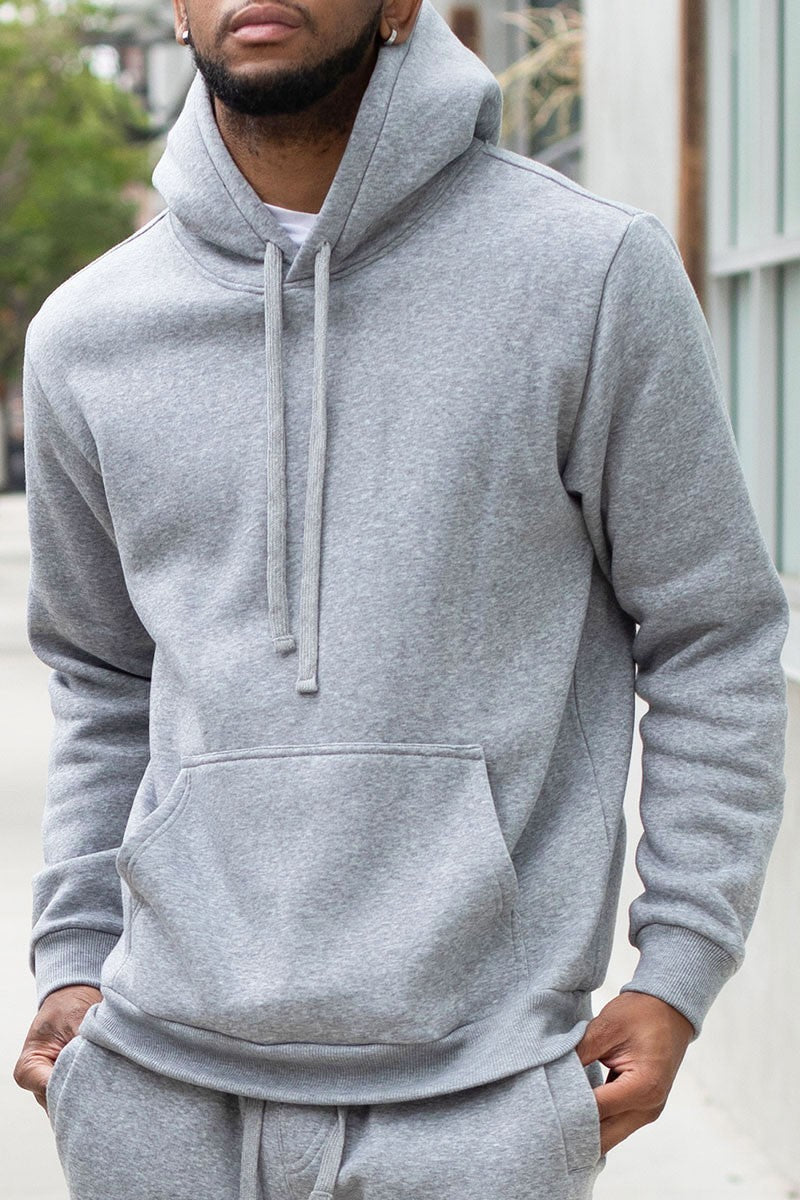 Heather Grey Fleece Pullover Hoodie with Kangaroo Pocket, featuring ribbed cuffs and adjustable drawstring for a cozy fit.