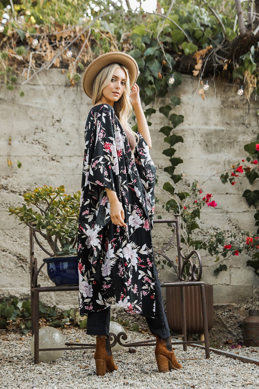 A stylish Floral Butterfly Sleeve Kimono featuring a vibrant floral pattern, showcasing butterfly sleeves and lightweight fabric, perfect for any occasion.