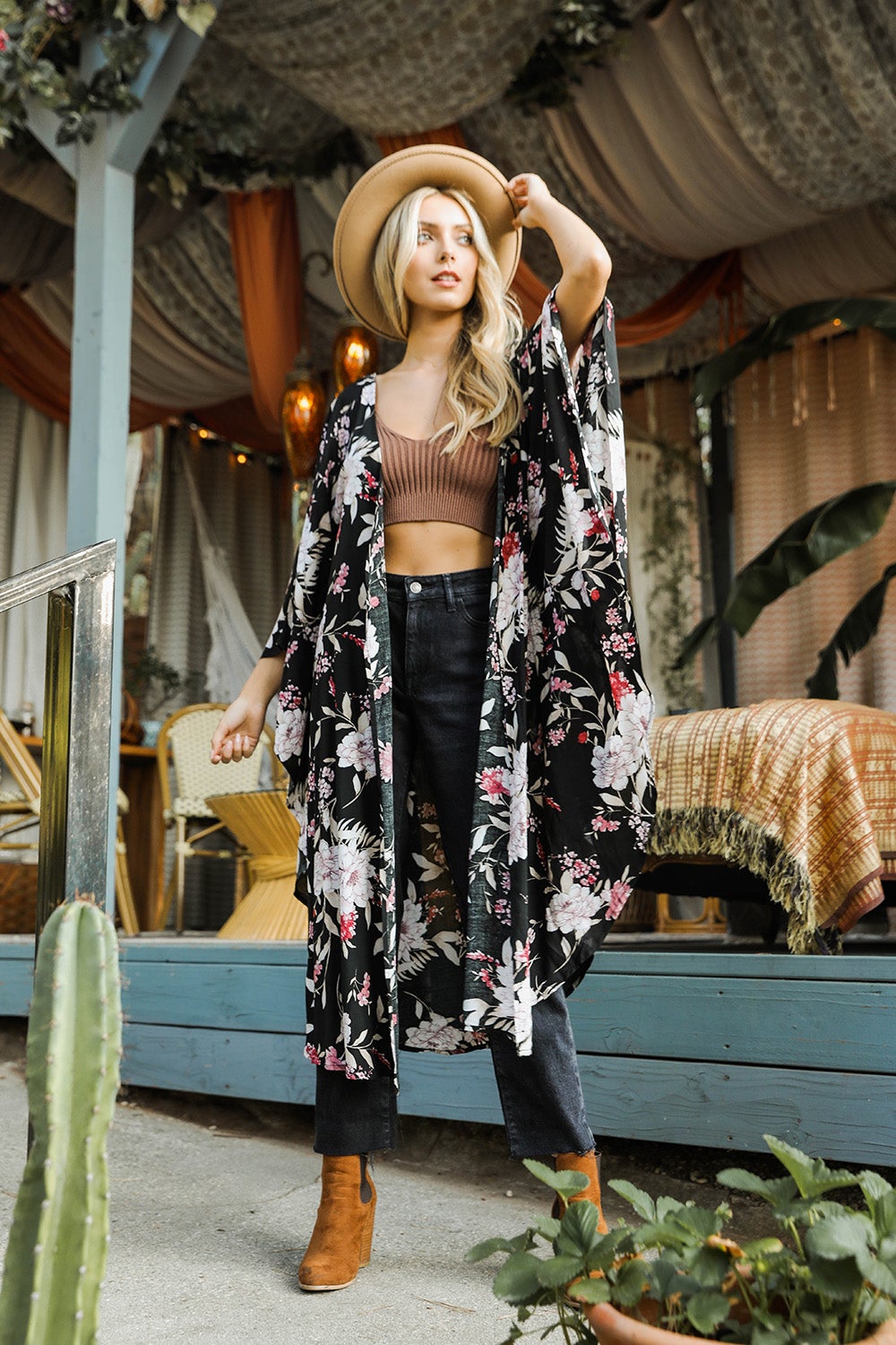 A stylish Floral Butterfly Sleeve Kimono featuring a vibrant floral pattern, showcasing butterfly sleeves and lightweight fabric, perfect for any occasion.