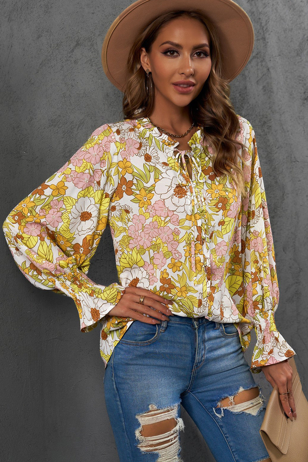 A stylish Floral Frill Trim Tie Neck Flounce Sleeve Blouse featuring a vibrant floral pattern, flounce sleeves, and a chic tie neck design.