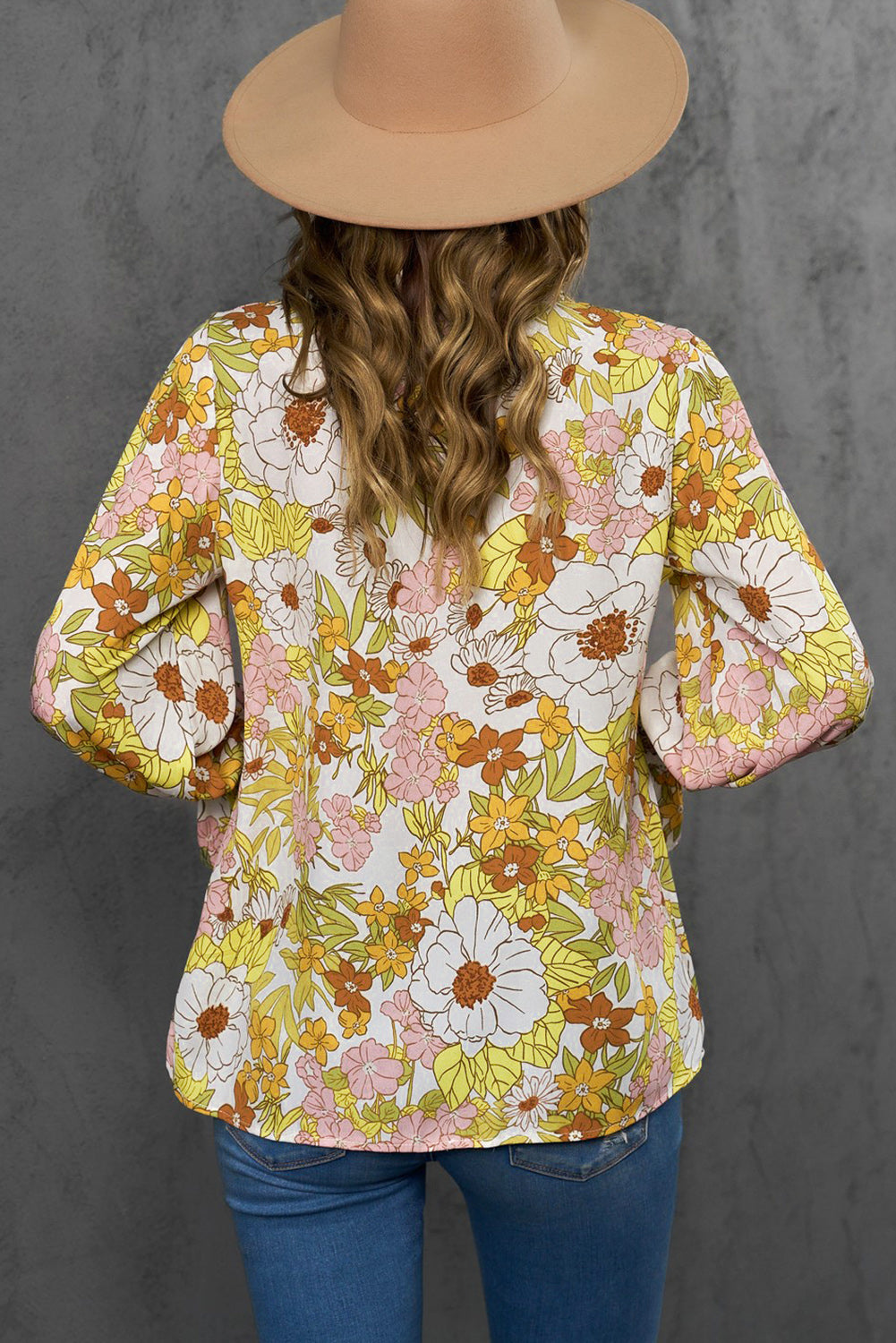 A stylish Floral Frill Trim Tie Neck Flounce Sleeve Blouse featuring a vibrant floral pattern, flounce sleeves, and a chic tie neck design.