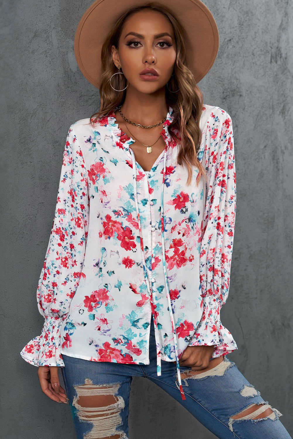 A stylish Floral Frill Trim Tie Neck Flounce Sleeve Blouse featuring a vibrant floral pattern, flounce sleeves, and a chic tie neck design.