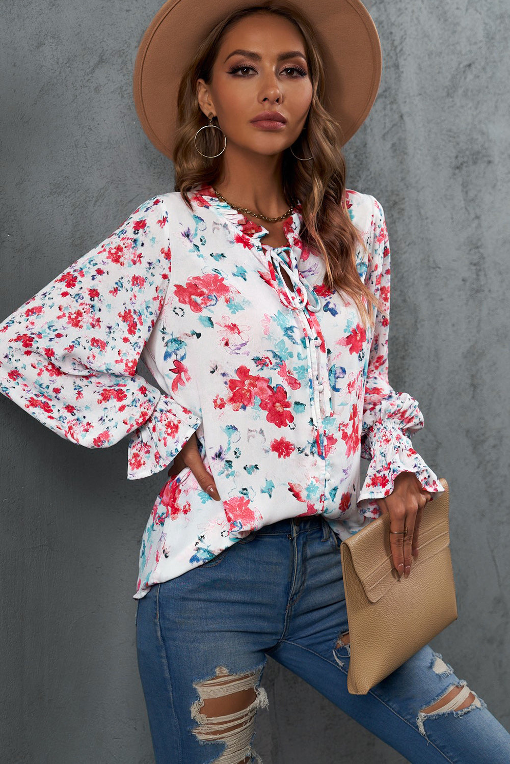 A stylish Floral Frill Trim Tie Neck Flounce Sleeve Blouse featuring a vibrant floral pattern, flounce sleeves, and a chic tie neck design.