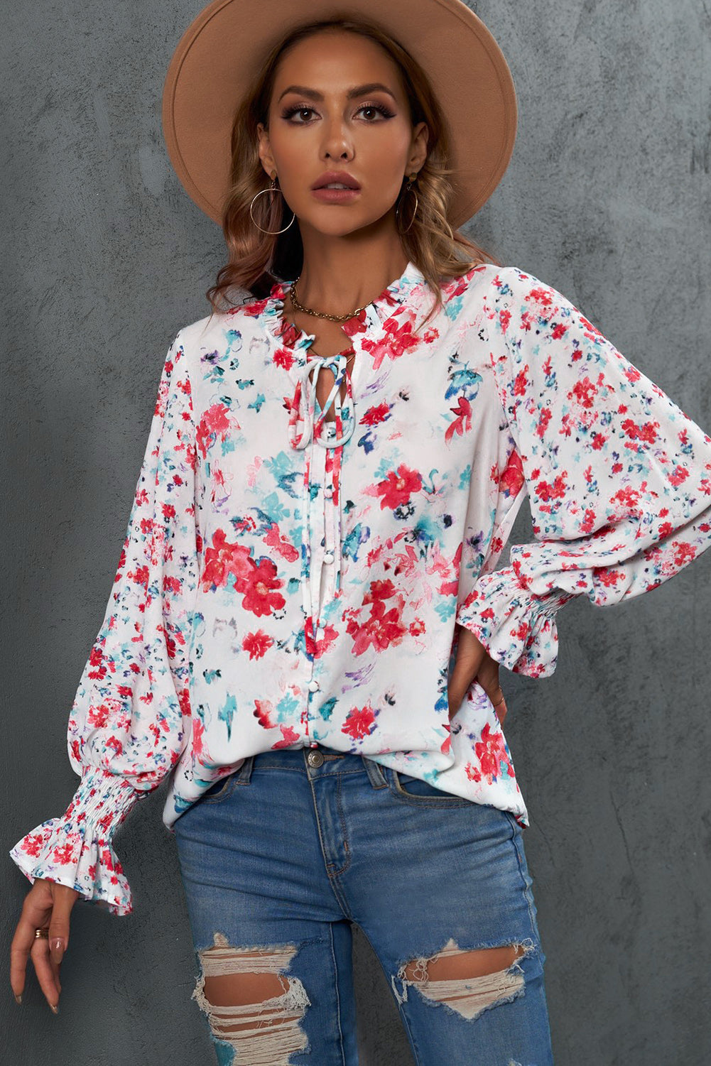 A stylish Floral Frill Trim Tie Neck Flounce Sleeve Blouse featuring a vibrant floral pattern, flounce sleeves, and a chic tie neck design.