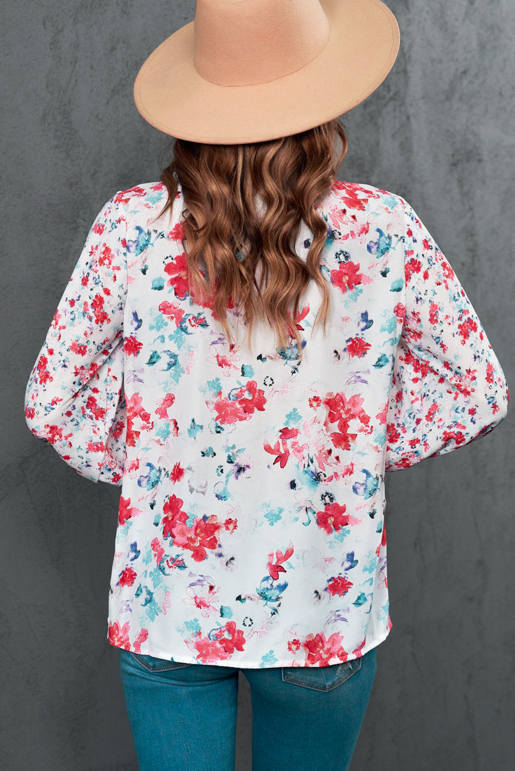 A stylish Floral Frill Trim Tie Neck Flounce Sleeve Blouse featuring a vibrant floral pattern, flounce sleeves, and a chic tie neck design.