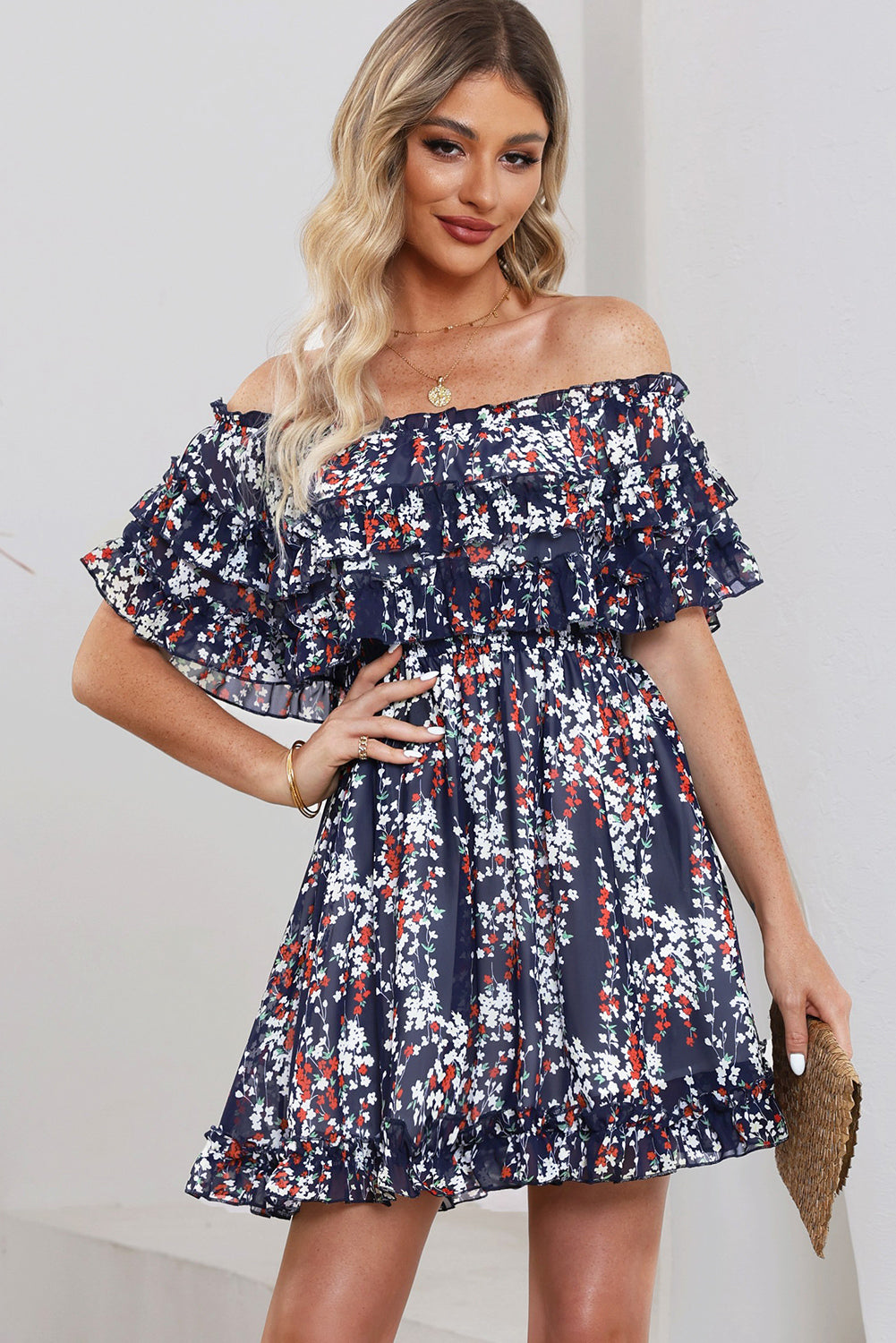 A stylish floral off-shoulder dress with ruffle hem, showcasing a chic design perfect for summer outings.