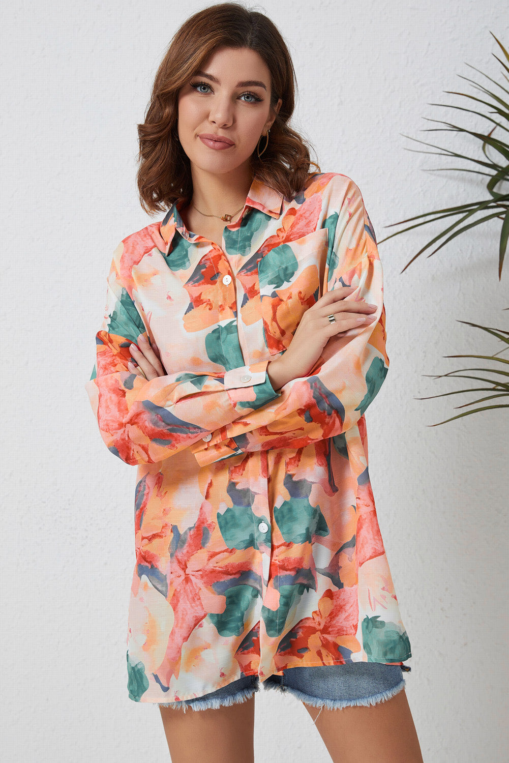 A stylish floral print loose shirt featuring a chic vintage design, perfect for casual and formal occasions.