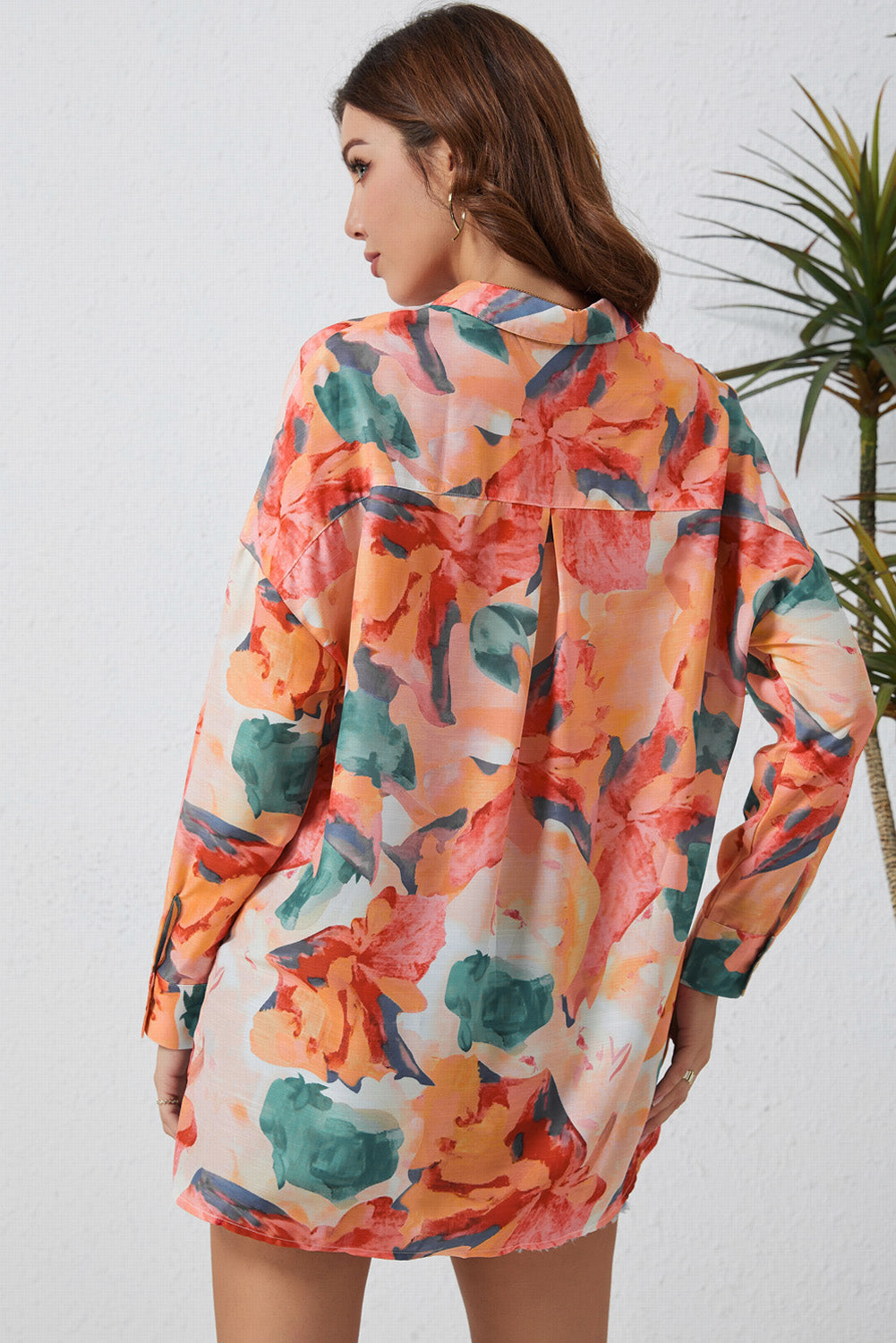 A stylish floral print loose shirt featuring a chic vintage design, perfect for casual and formal occasions.