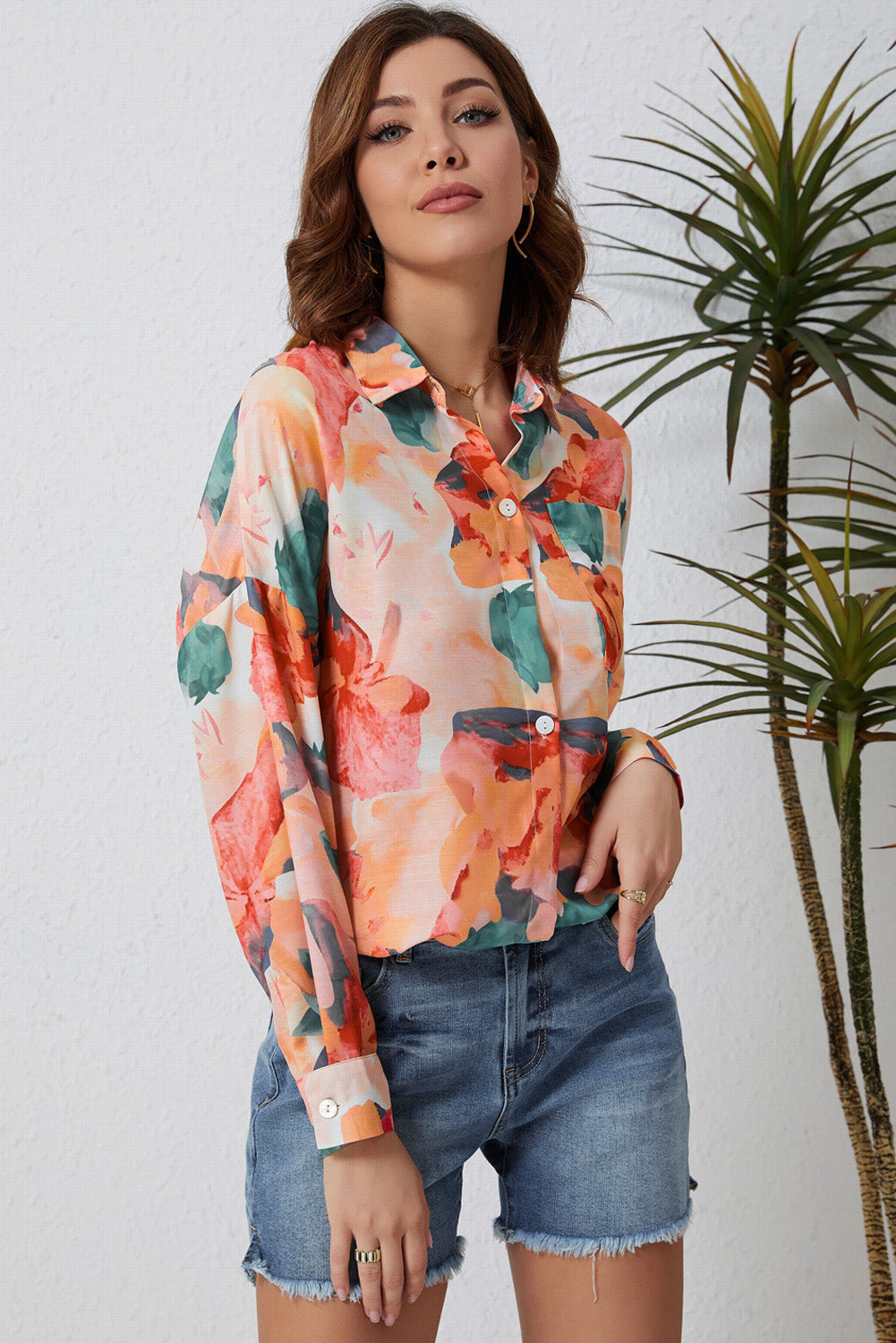 A stylish floral print loose shirt featuring a chic vintage design, perfect for casual and formal occasions.