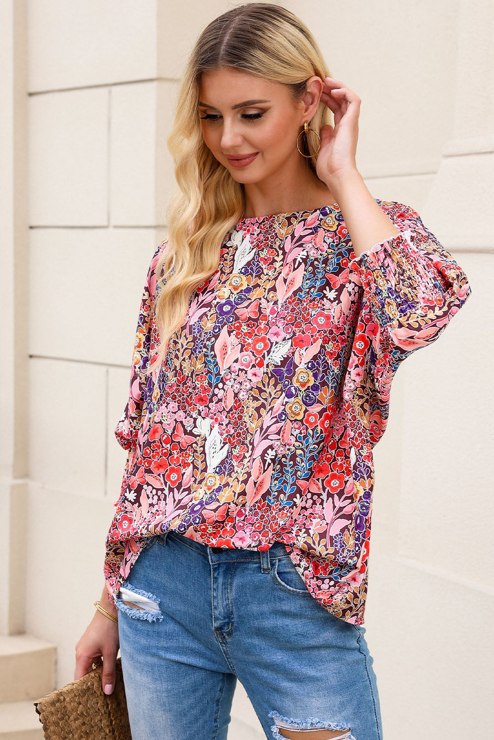 A stylish Floral Print Shirred Tunic Blouse featuring a vibrant flower pattern, bateau neckline, and elegant shirred 3/4 sleeves, perfect for any occasion.