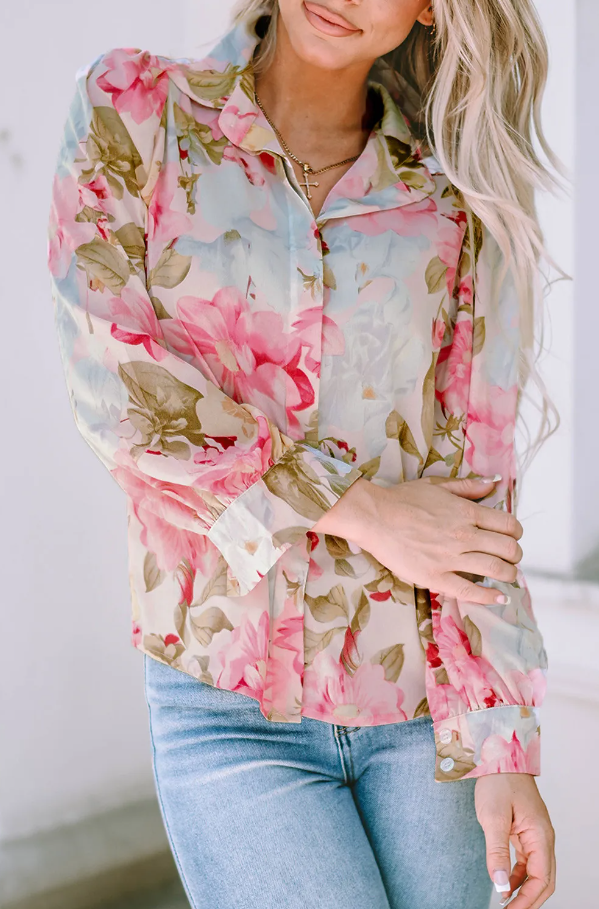 Elegant pink floral print shirt with classic collar and long sleeves, made from high-quality polyester fabric.