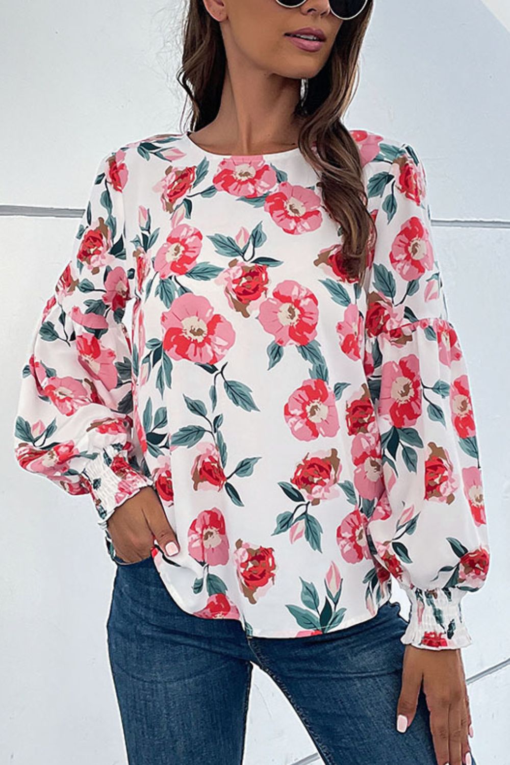 Floral Puff Sleeve Round Neck Blouse featuring a vibrant floral pattern, puff sleeves, and a round neckline, perfect for casual wear.