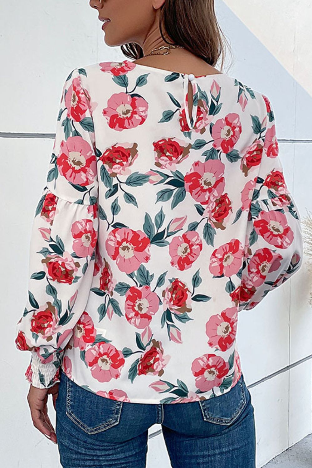 Floral Puff Sleeve Round Neck Blouse featuring a vibrant floral pattern, puff sleeves, and a round neckline, perfect for casual wear.