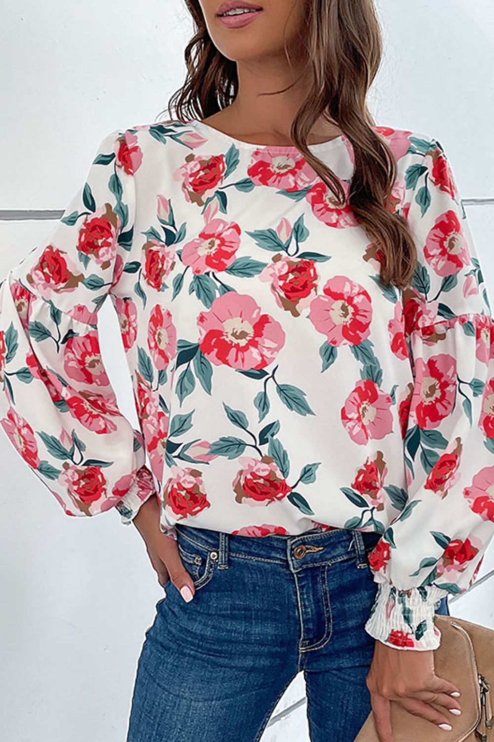 Floral Puff Sleeve Round Neck Blouse featuring a vibrant floral pattern, puff sleeves, and a round neckline, perfect for casual wear.