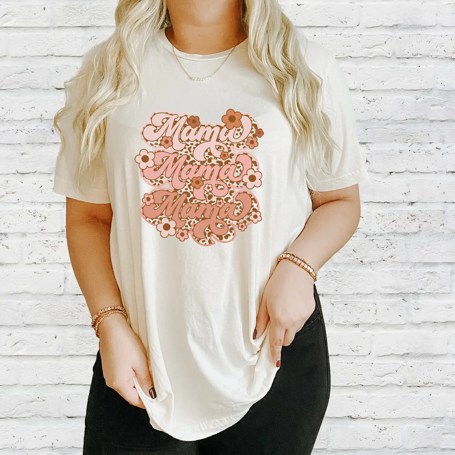 Floral Retro Mama Stacked Tee featuring a vibrant floral design on a comfortable unisex fit shirt, perfect for casual wear.