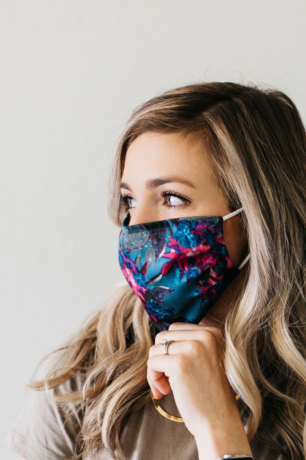 Floral Satin Face Mask featuring a vibrant floral pattern, made of soft satin polyester with adjustable nylon ear loops.