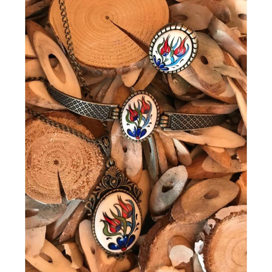 Handmade Floral Theme Bracelets jewelry set featuring a necklace, ring, and bracelet with vibrant ceramic tile designs.