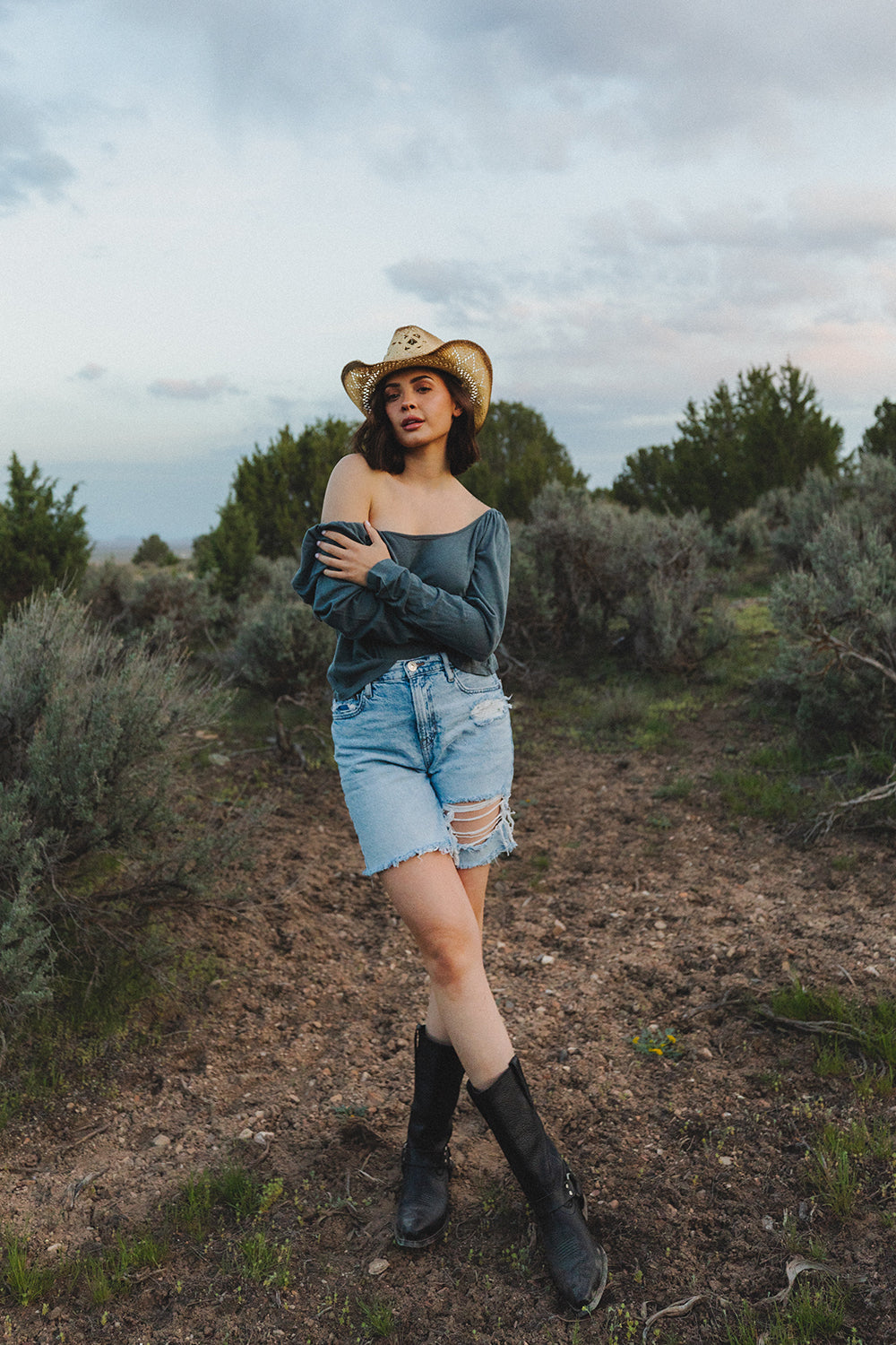 Flowy Tee in indigo and sky blue with puff shoulders and long sleeves, showcasing a scoop neck design.