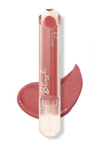 Fluid Sheer Glow Enhancer Liquid Blush #P07 in a sleek bottle, showcasing its vibrant color and lightweight texture.