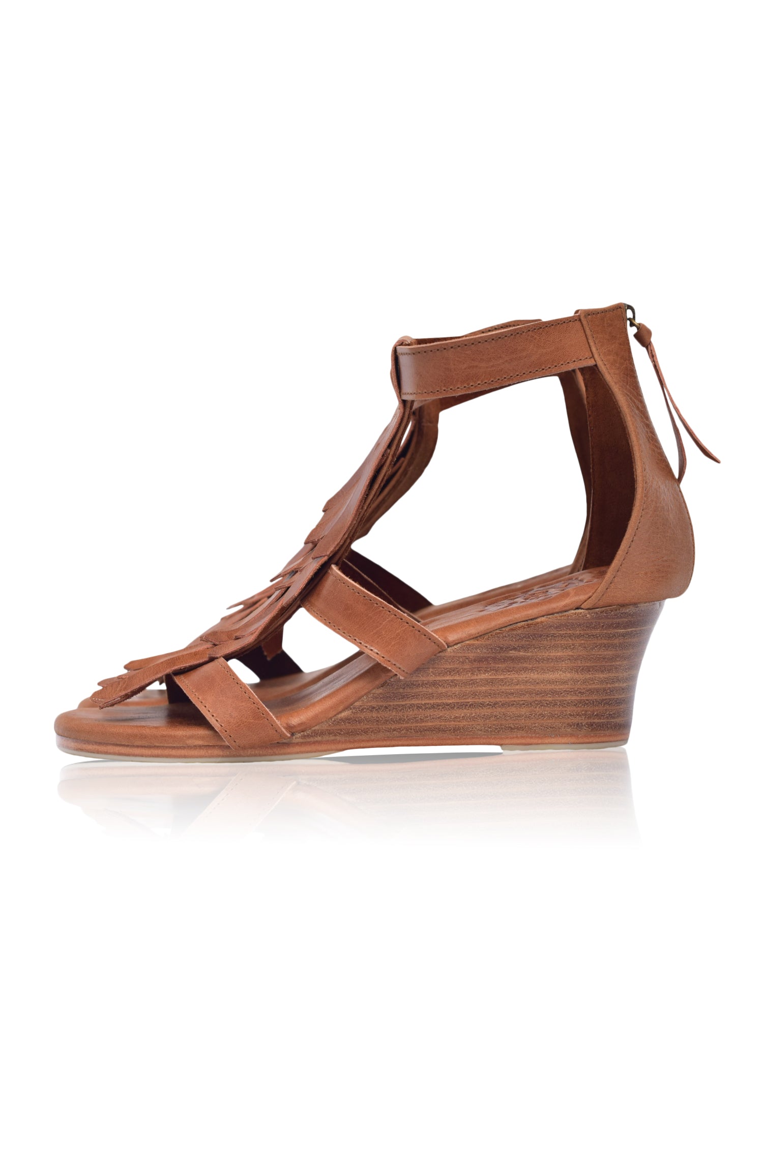 Fly Away Fringe Sandals featuring chic fringe detailing and a comfortable wooden wedge, perfect for summer wear.