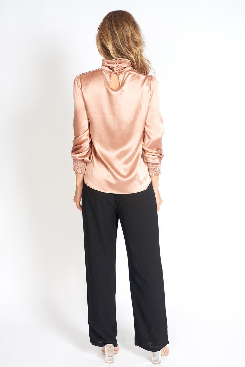 Fíona 100% Silk Turtleneck Blouse featuring elasticated smocking, blouson sleeves, and a luxurious sheen in a relaxed fit.