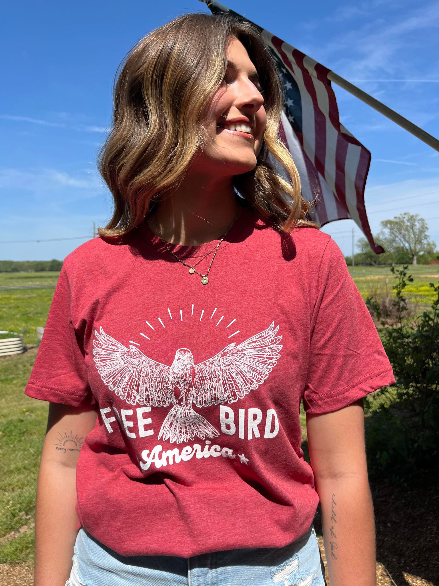 Free Bird: America graphic tee featuring a bird design, perfect for celebrating Independence Day.