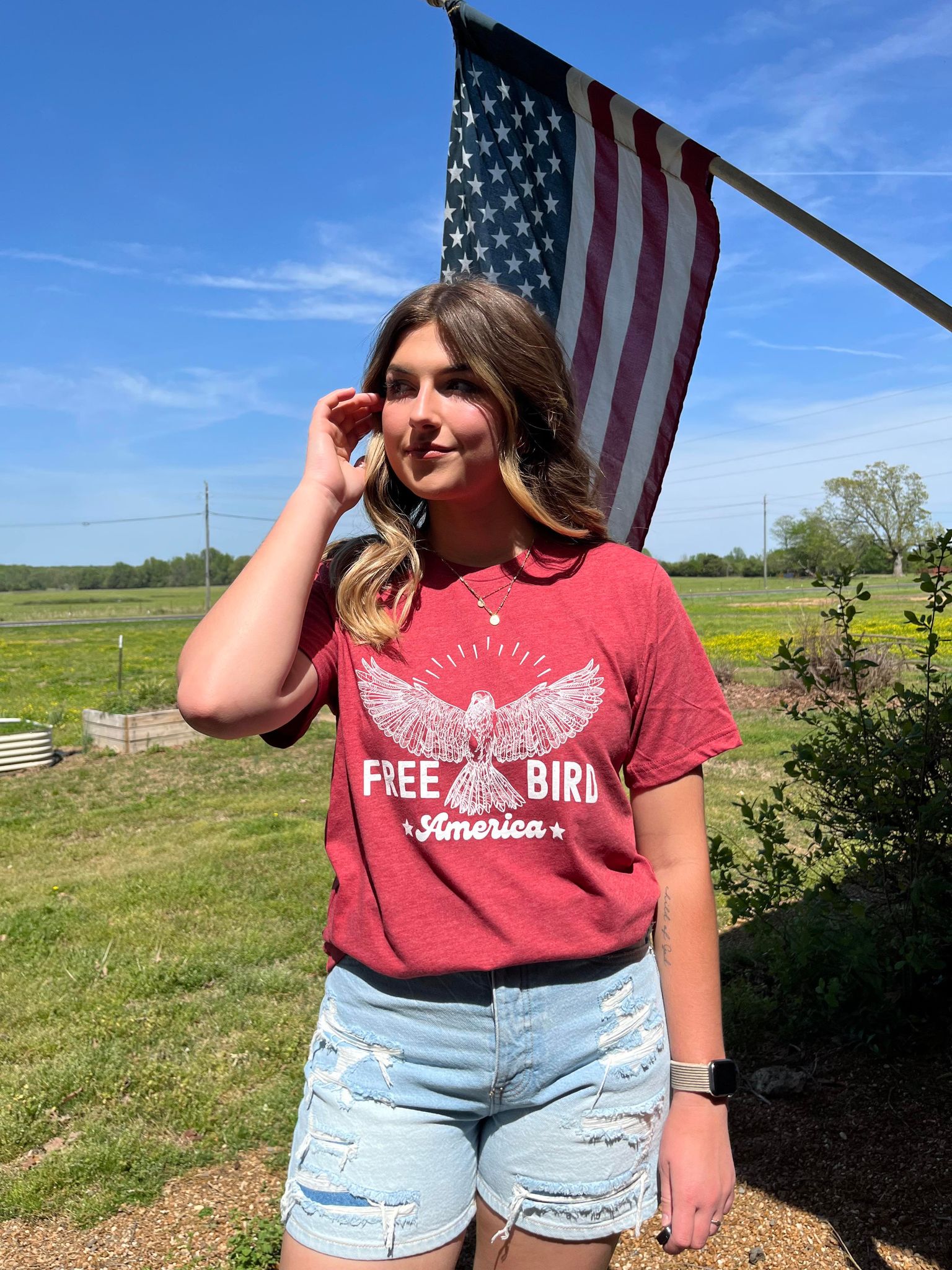 Free Bird: America graphic tee featuring a bird design, perfect for celebrating Independence Day.